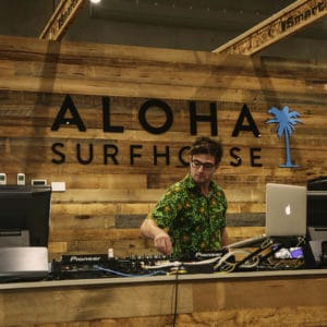 A Dj Playing Music Inside The Surfhouse