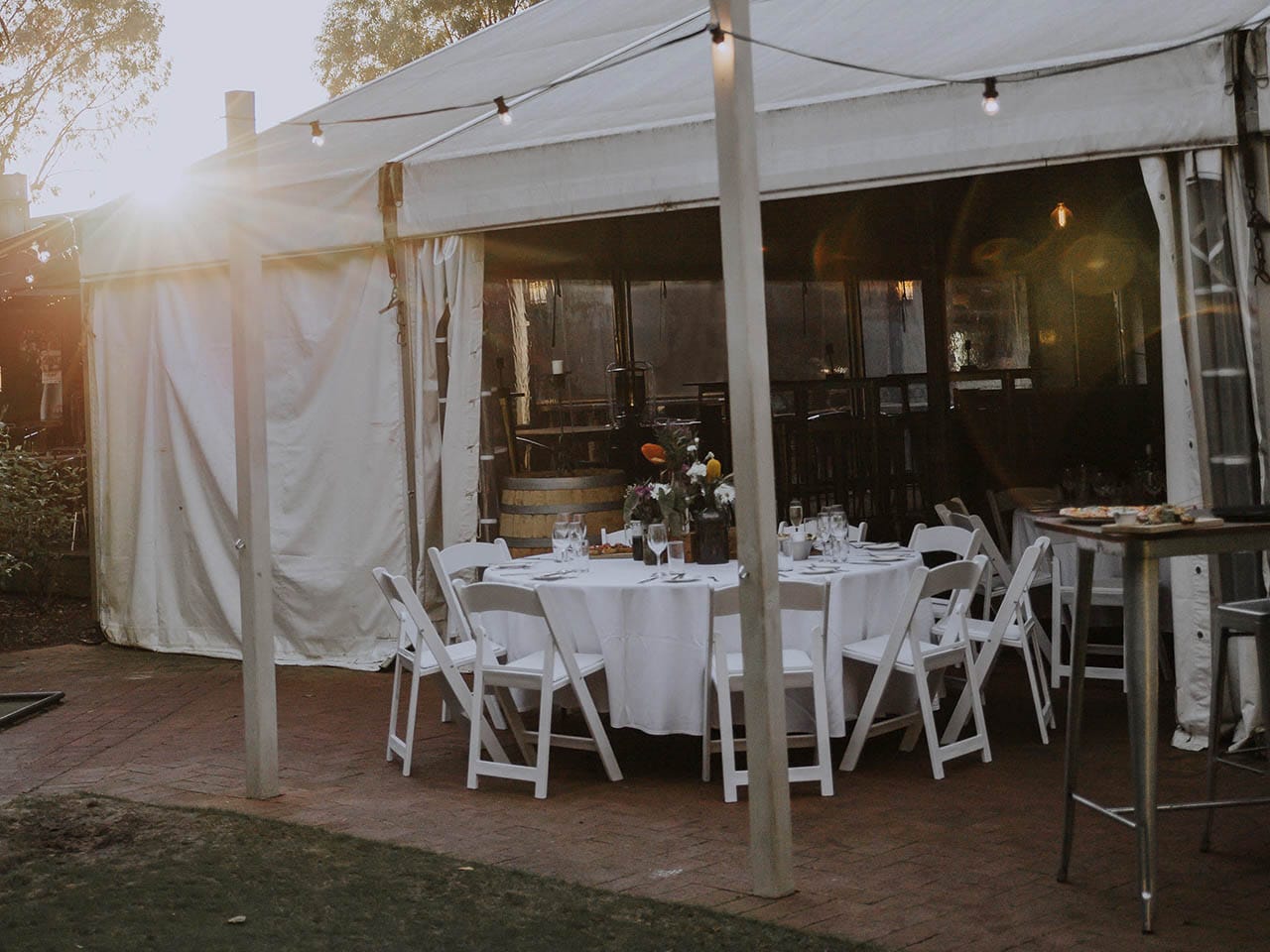 The Tent At Leapfrogs Set Up For A Dinner With Fairy-lights