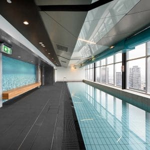 Infinity Pool Inside The Building with City View