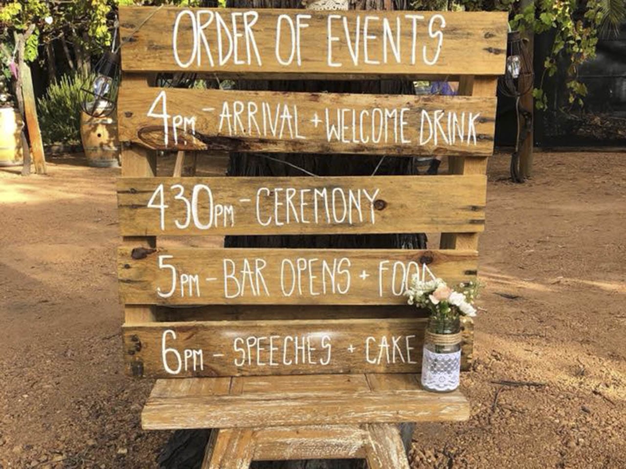 Time Table Of The Event Written In Wood