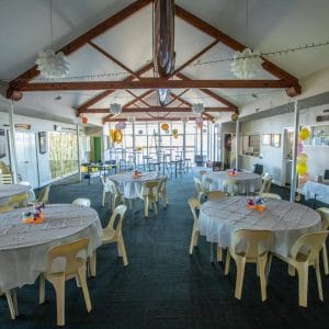 Casual Function Set Up With Round Tables And Chairs At Swan River Rowing Club Riverside Venue