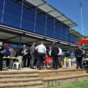 People Gathered In An Event Outside Function Room