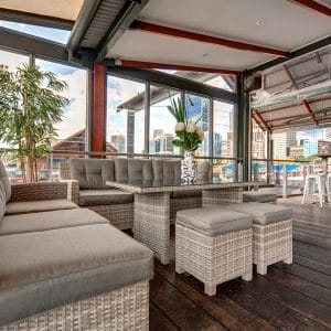 Perth Function Venue With Relaxing Chairs And Table Inside The Function Room Fronting The Balcony