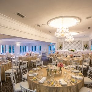 Long Table And Banquet Style Setup Inside The Function Room With Chandeliers