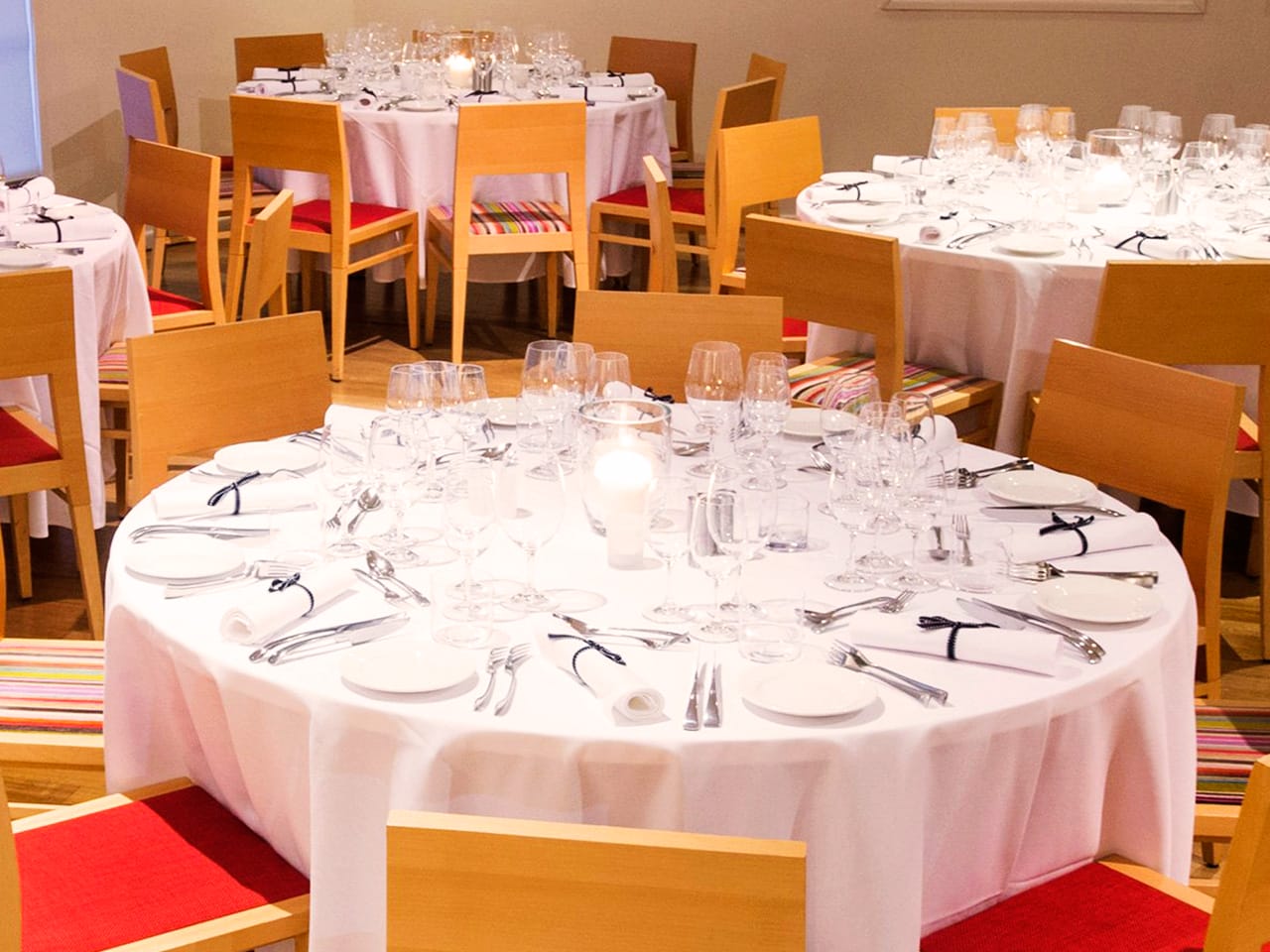 Tables And Chairs In Banquet Style Inside The Function Room
