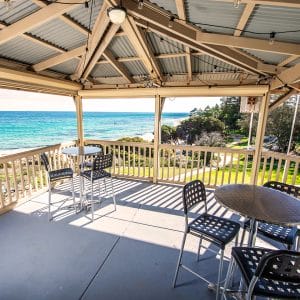Function Room's Terrace With Ocean View, Few Chairs And Tables