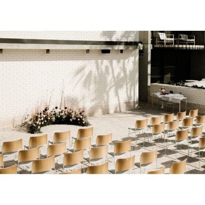 Roof top row seating facing ceremony flowers