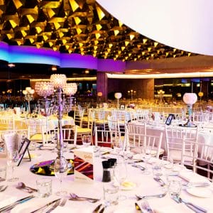 Round white tables set for an event