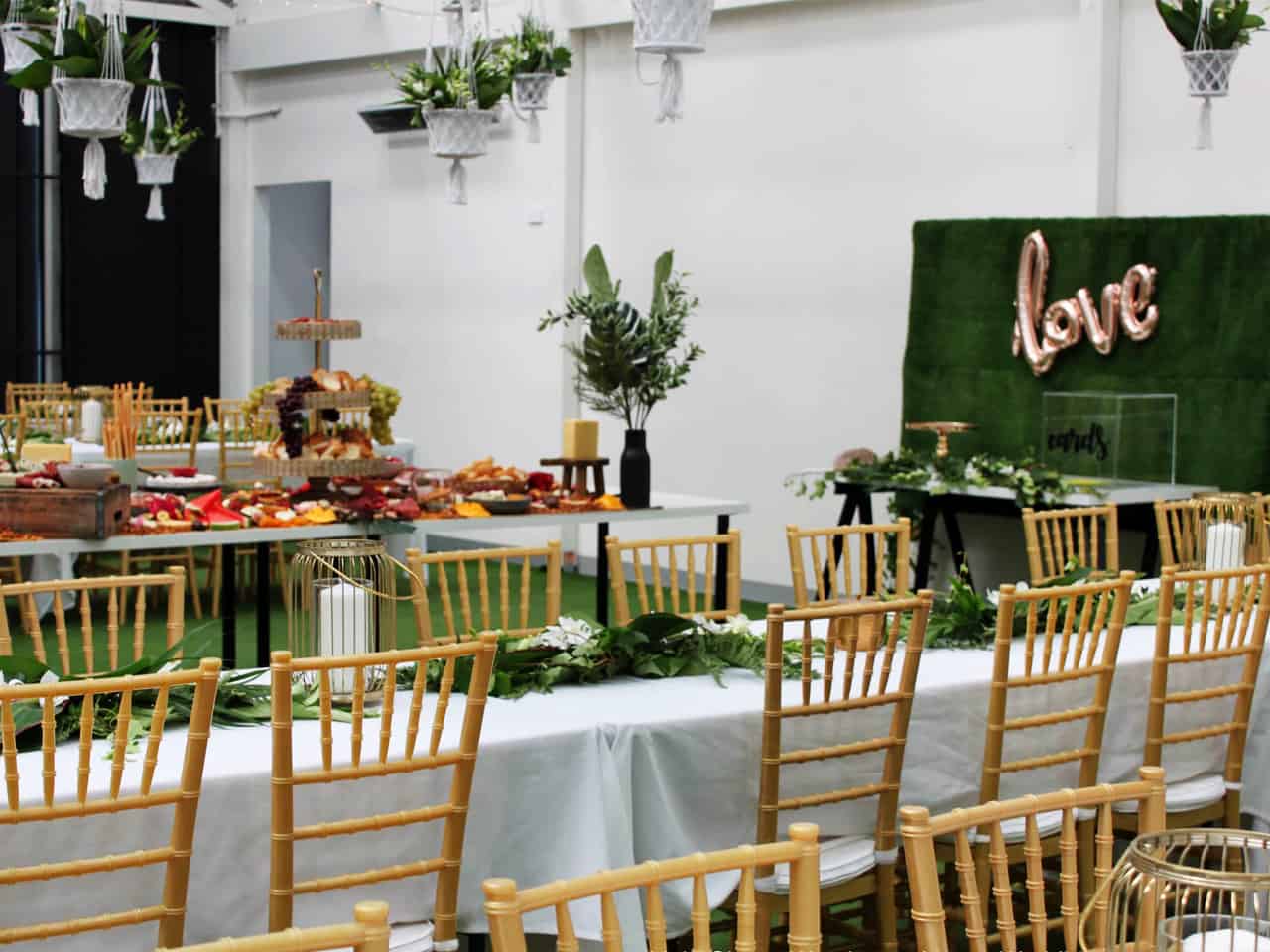 Long tables with wooden chairs