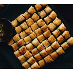 A platter of crispy fried spring rolls